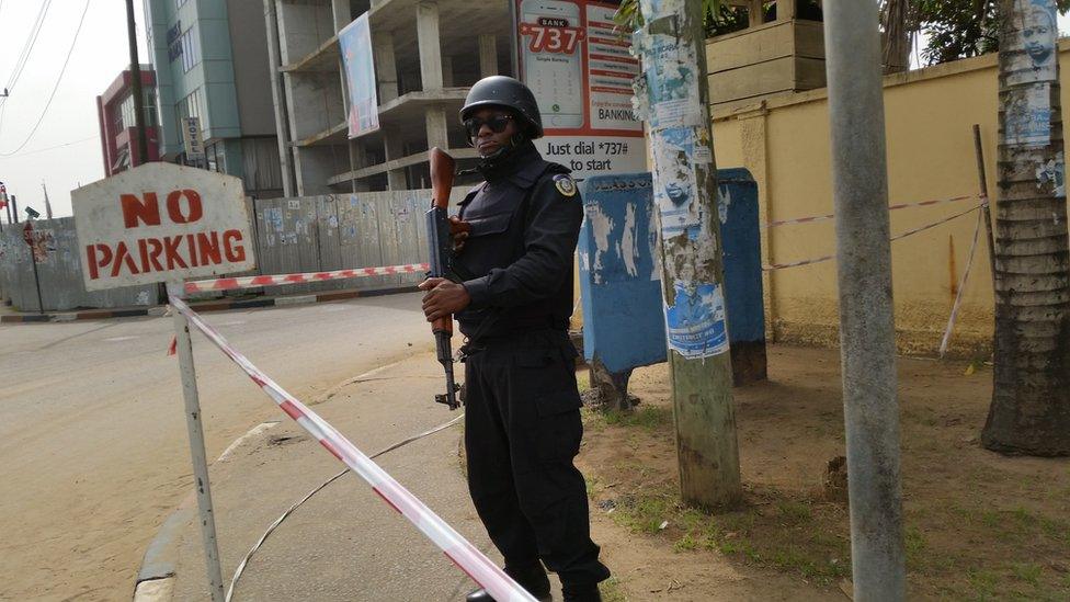 Armed police at Liberia electoral commission offices in Monrovia