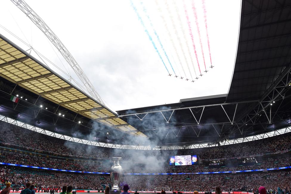 The Royal Air Force Aerobatic Team, the Red Arrows, perform a fly-past over Wembley Stadium in London on July 11, 2021 before kick off of the UEFA EURO 2020 final football match between Italy and England.