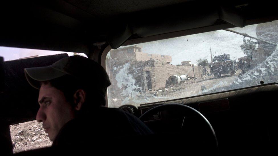 An Iraqi special forces soldier in a Humvee in Bazwaya, east of Mosul