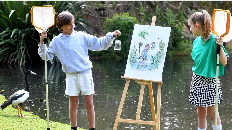 Children looking at a famous piece of Quentin Blake art