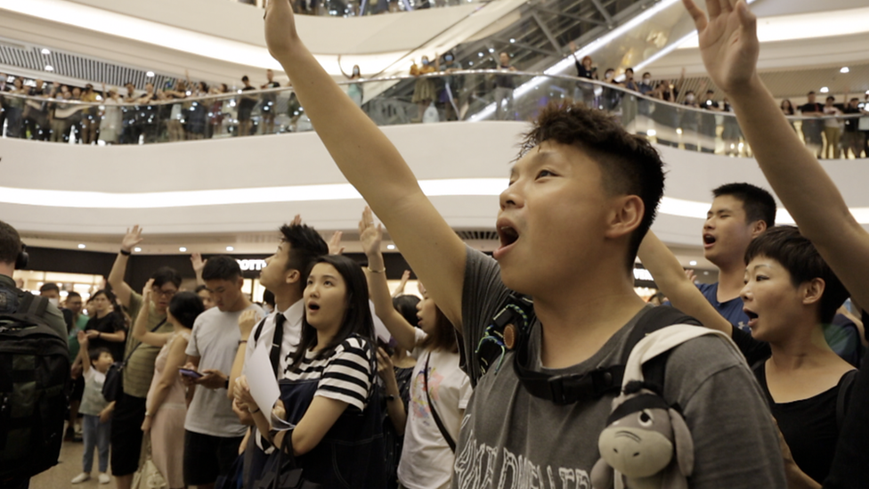 Protesters singing