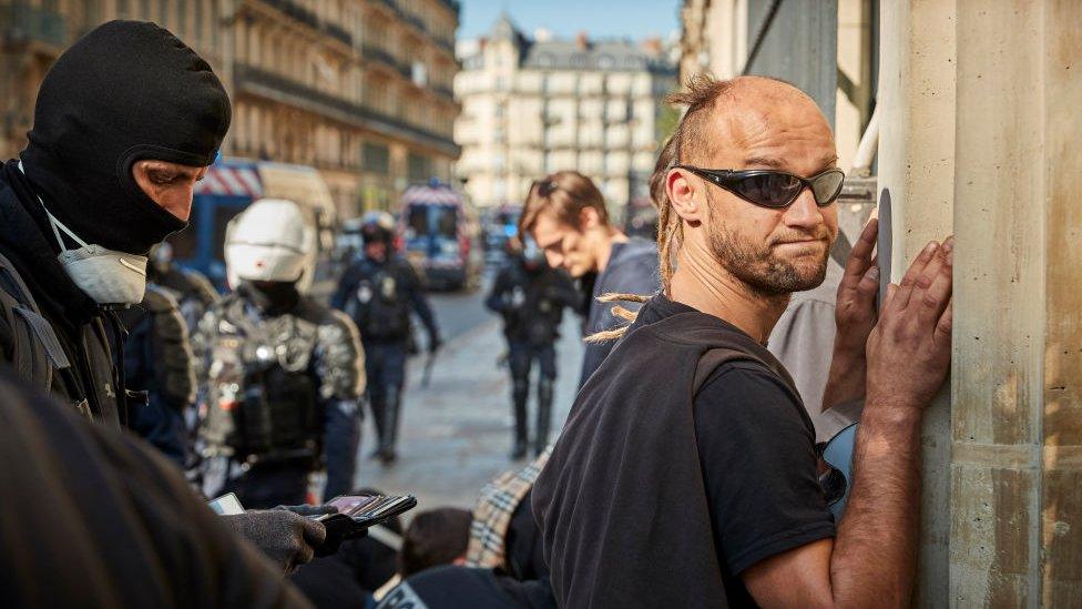 A yellow vest protester being arrested in Paris