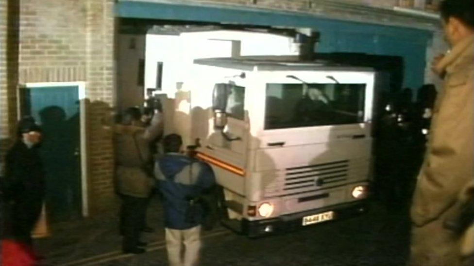 Bishop in a prison van after conviction