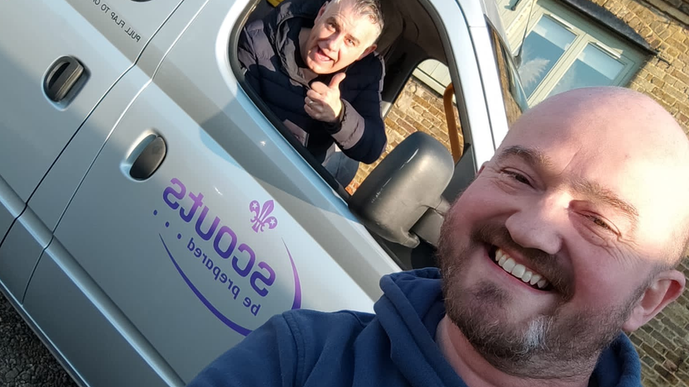 Adam Hale-Sutton (right) and follow volunteer Mike Kenny (left) and the Scouts minibus