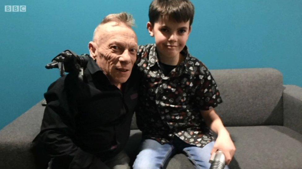 Cameron with Jimmy Vee who is R2-D2