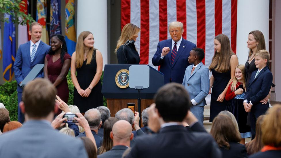 Barrett with her family at an event to announce Trump's nominee