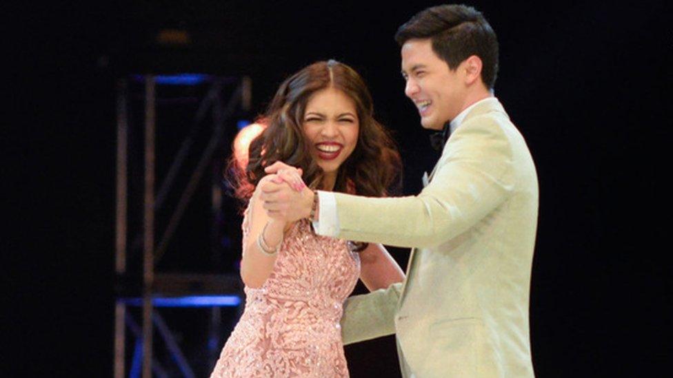 Filipino actors Alden Richards and Maine Mendoza perform at a charity concert in Manila, the Philippines