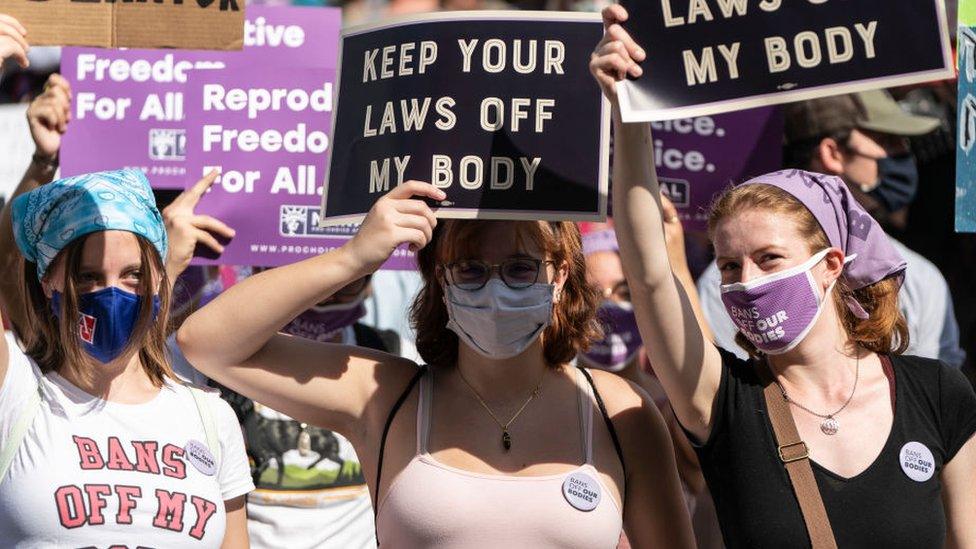 Women's rights activists in Washington D.C protesting against the new abortion bill.