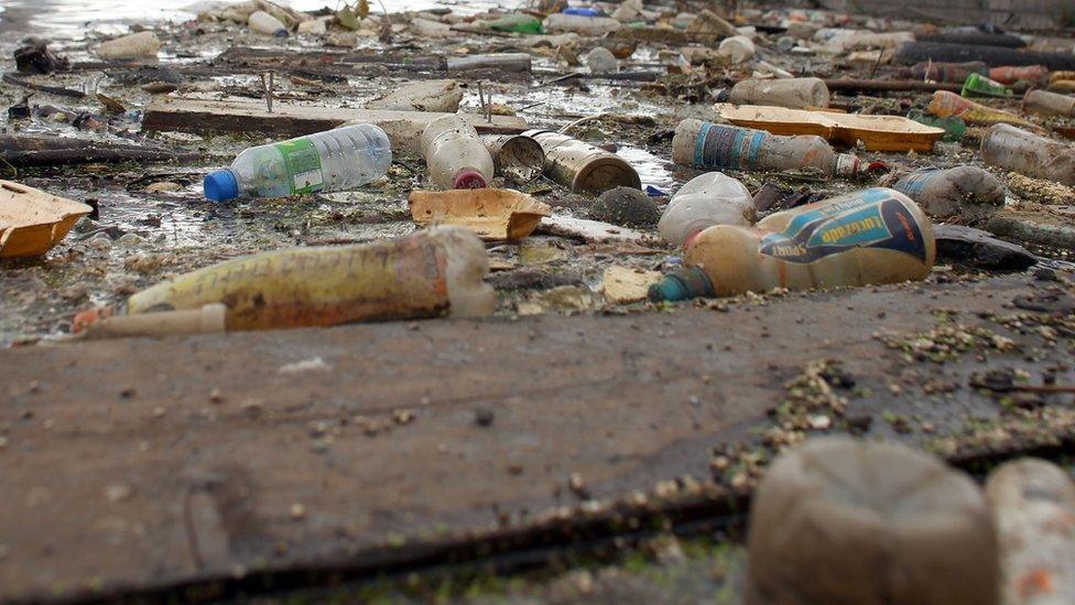 bottles in river.