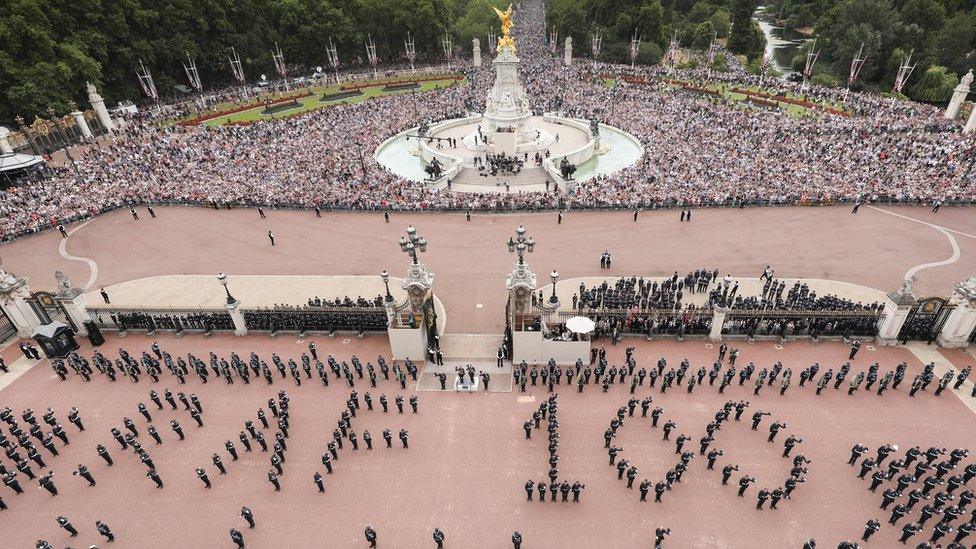 RAF personnel and crowds outside Buckingham Palace