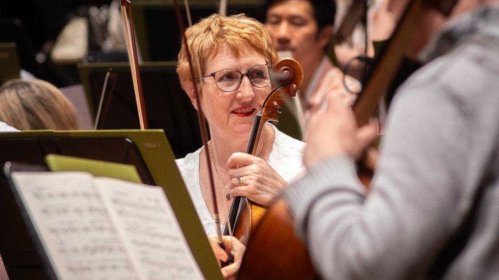 Jacoba Gale holding her viola