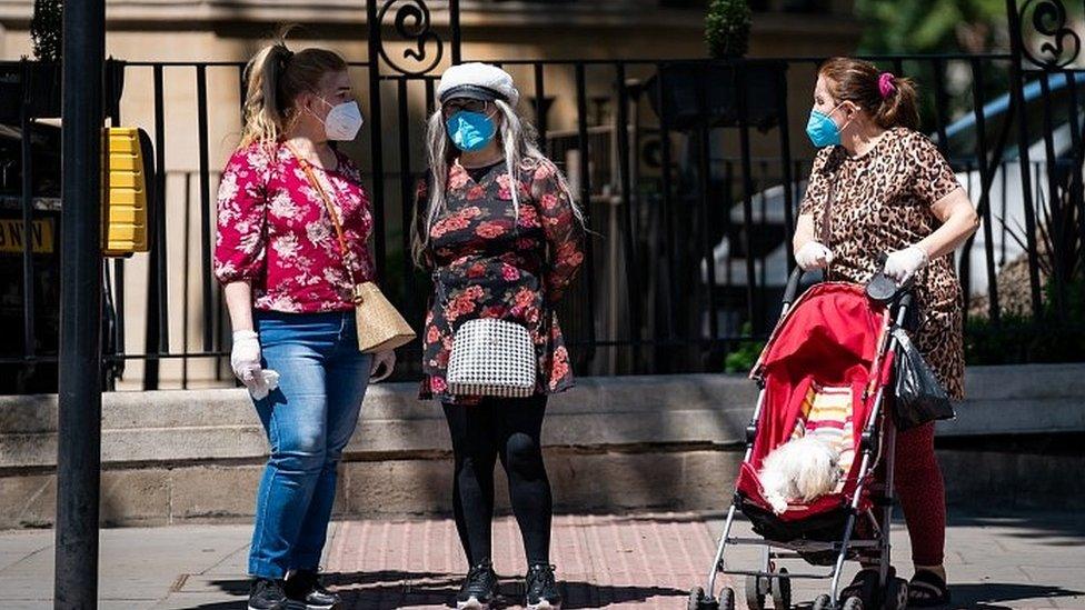 People wearing face masks in London