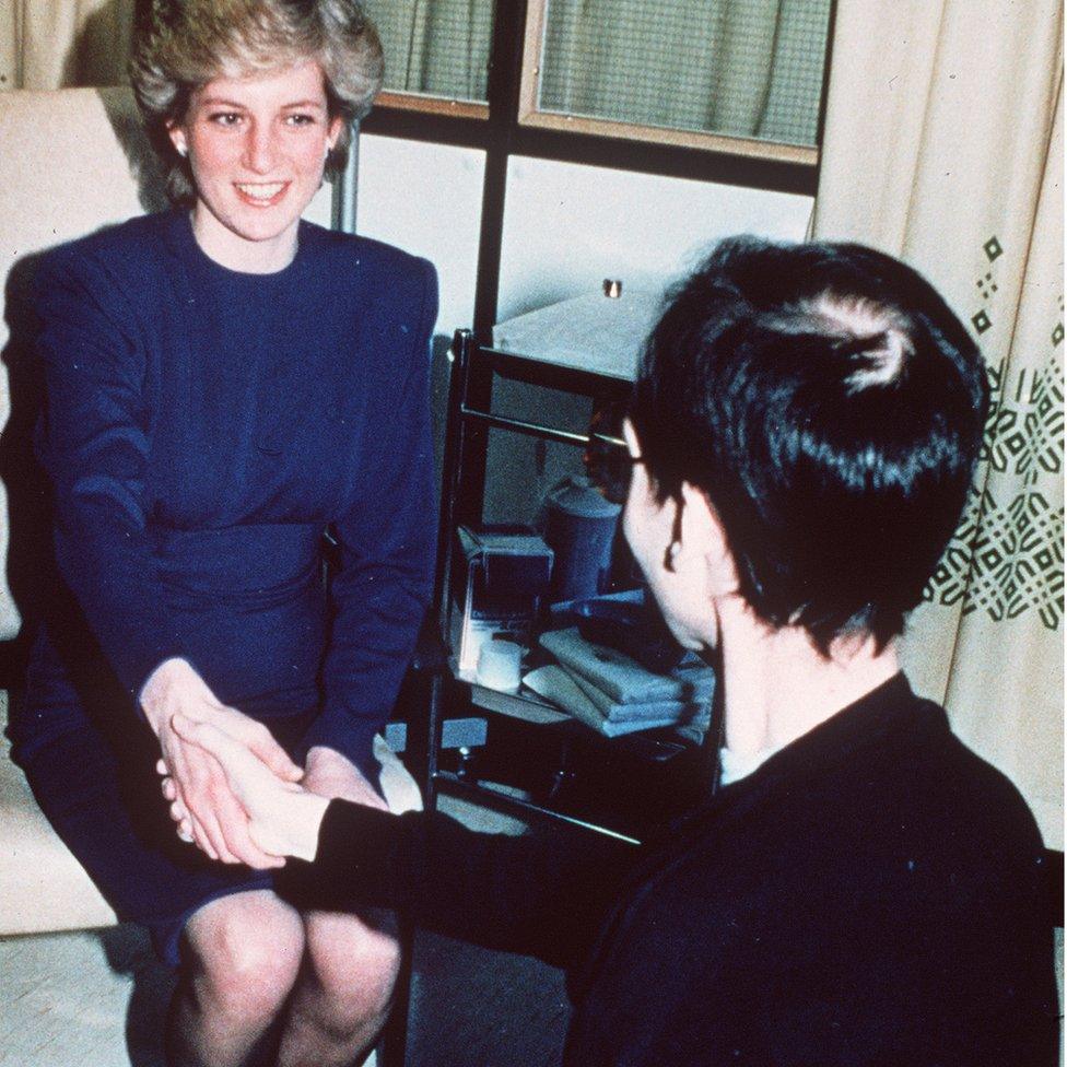 Diana, Princess of Wales shakes hands with an Aids victim as she opened a new Aids ward at London's Middlesex Hospital on April 9, 1987.