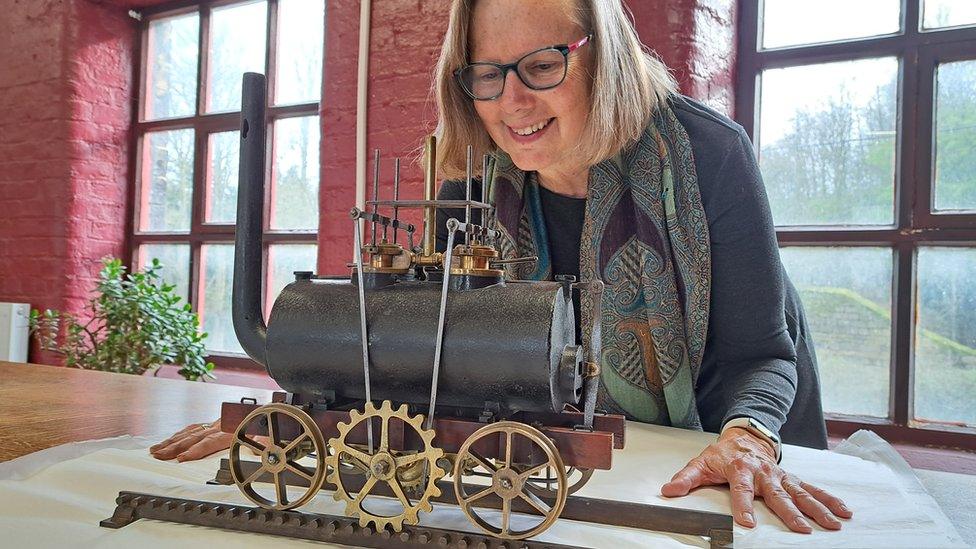 Lisa Roger with model locomotive