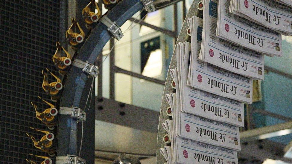 A picture taken on November 27, 2014 in Ivry-sur-Seine, outside Paris, shows the print house of the daily newspaper Le Monde.