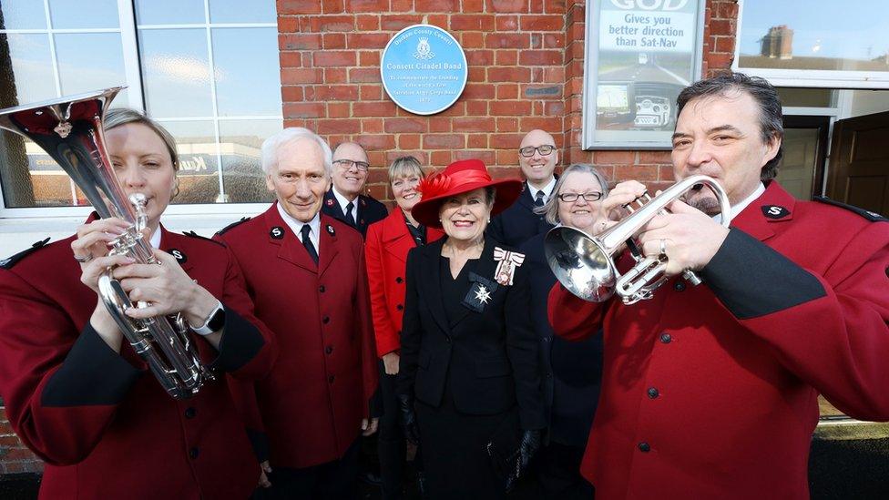 Major David Burns, North East England area leader for the Salvation Army, Sue Snowdon, Lord Lieutenant of County Durham, and Kelsey Thackeray with band members