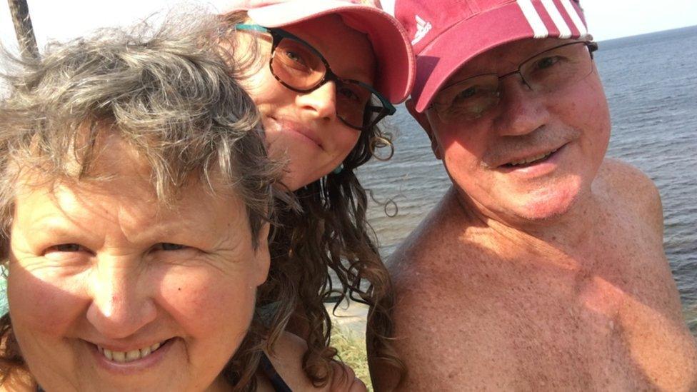 Yulia Popova with her parents