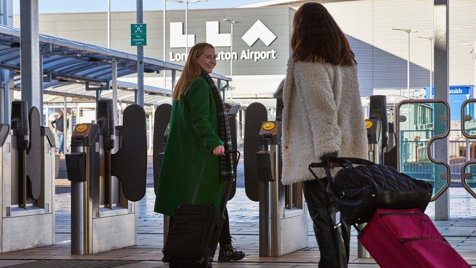 Two women about to ride the Luton Dart