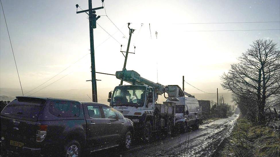 Power cables being repaired after damage caused by Storm Arwen