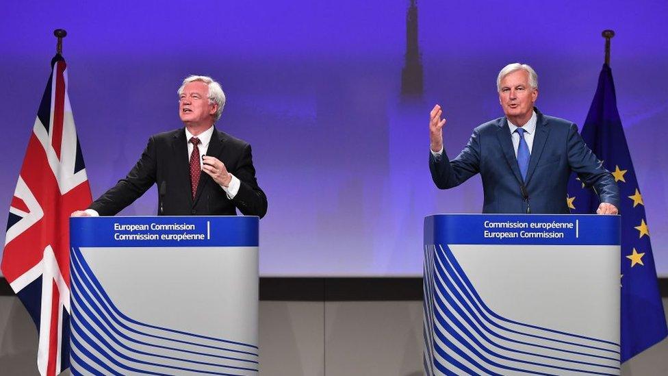 Secretary of State for Exiting the European Union (Brexit Minister) David Davis (L) and EU chief Brexit negotiator Michel Barnier