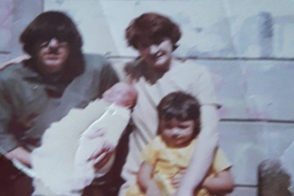 Joan Connolly with her adult son, her young daughter and her first grandchild