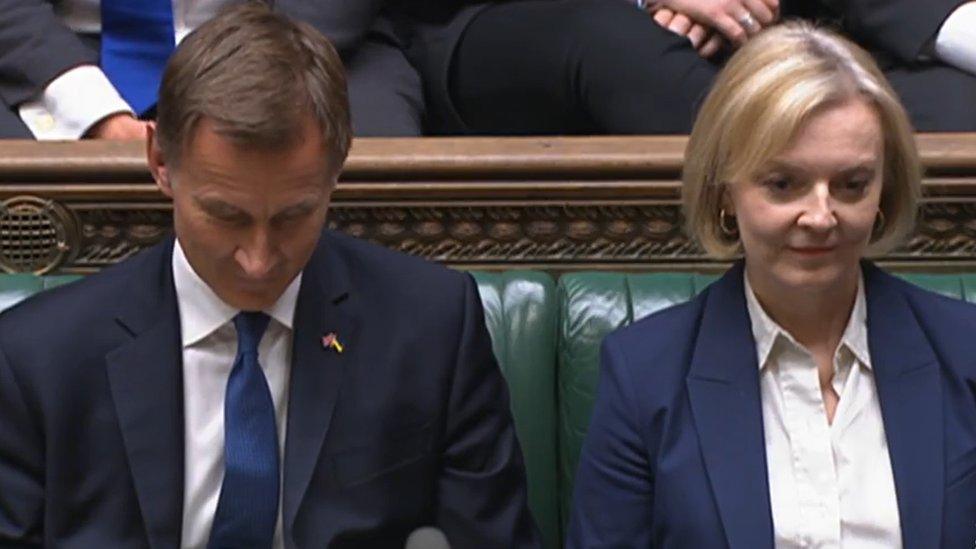 PM Liz Truss who made her first public appearance in the House of Commons since sacking her chancellor Kwasi Kwarteng and replacing him with Jeremy Hunt (left)