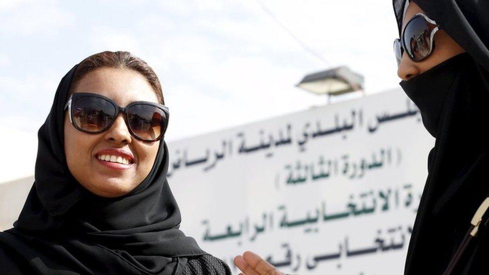 Saudi women leave a polling station after casting their vote in Riyadh