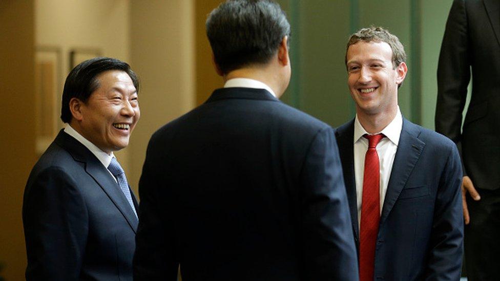 Lu Wei (L) and Mark Zuckerberg (R)