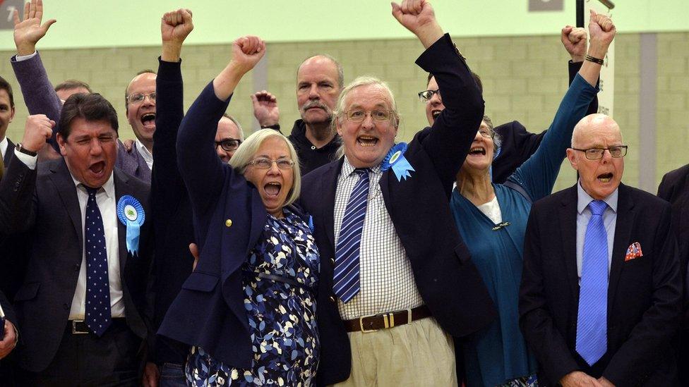 Conservatives celebrate after Stephen Hillier wins the seat for Langdon Hills during the count for Basildon