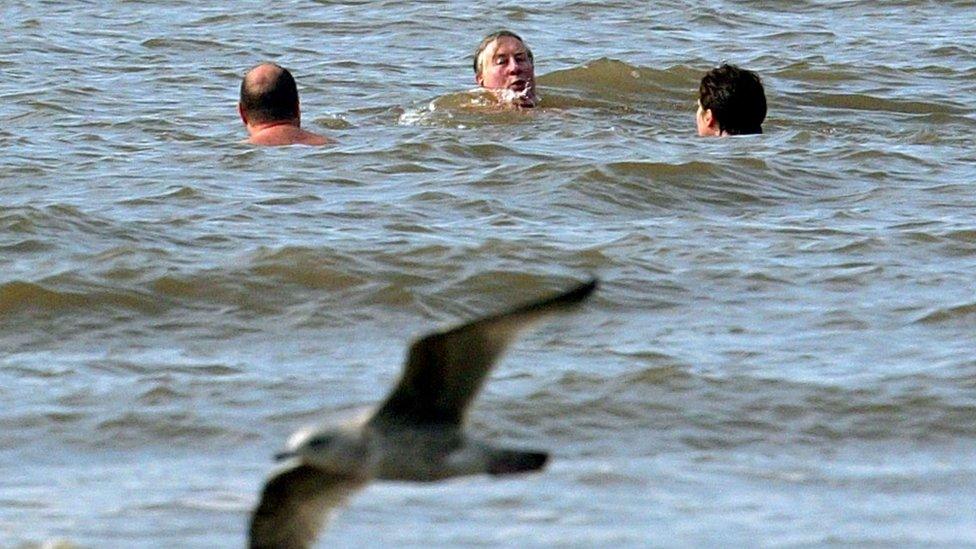 Michael Meacher swimming in the sea