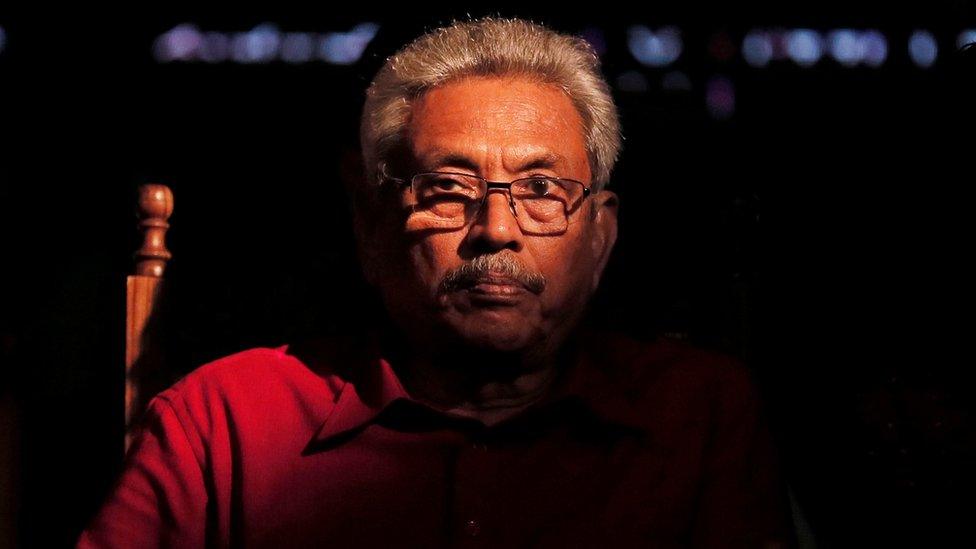 Sri Lanka People"s Front party presidential election candidate and former wartime defence chief Gotabaya Rajapaksa looks on during the final election campaign rally