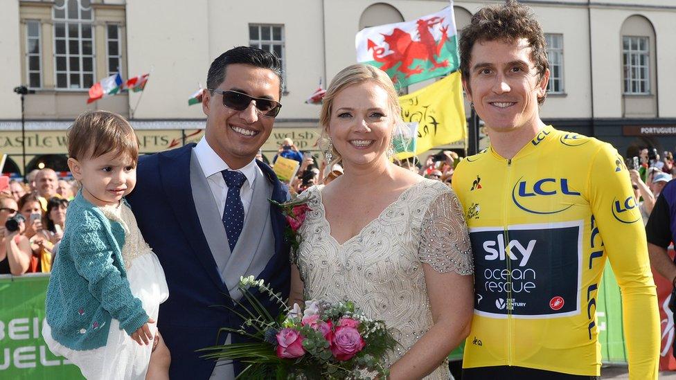 Geraint Thomas poses with a newly-married couple