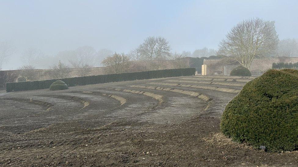 Tiered slops of amphitheatre