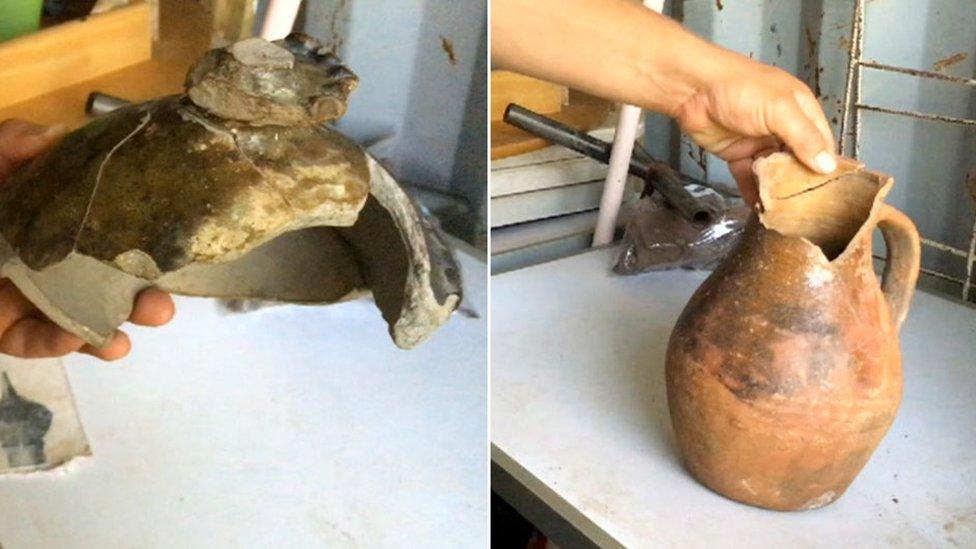 A medieval roof finial and a 15th Century jug found at Mr Wilson's site, known as Tinkers Land