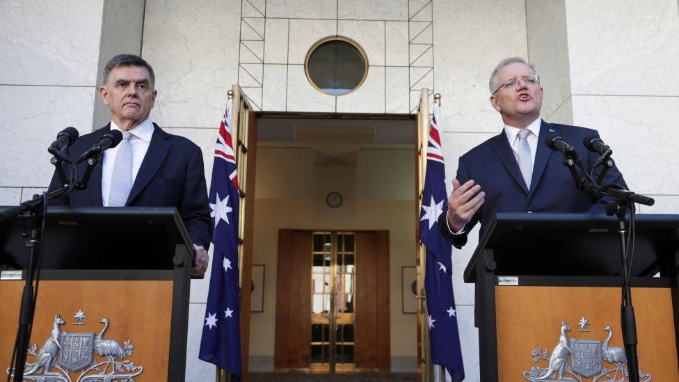 Dr Brendan Murphy and Prime Minister Scott Morrison address media outside Parliament House