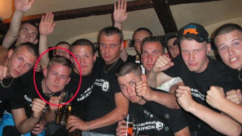 Benedikt Kaiser is seen here (circled) as part of a group of ultranationalist hooligans