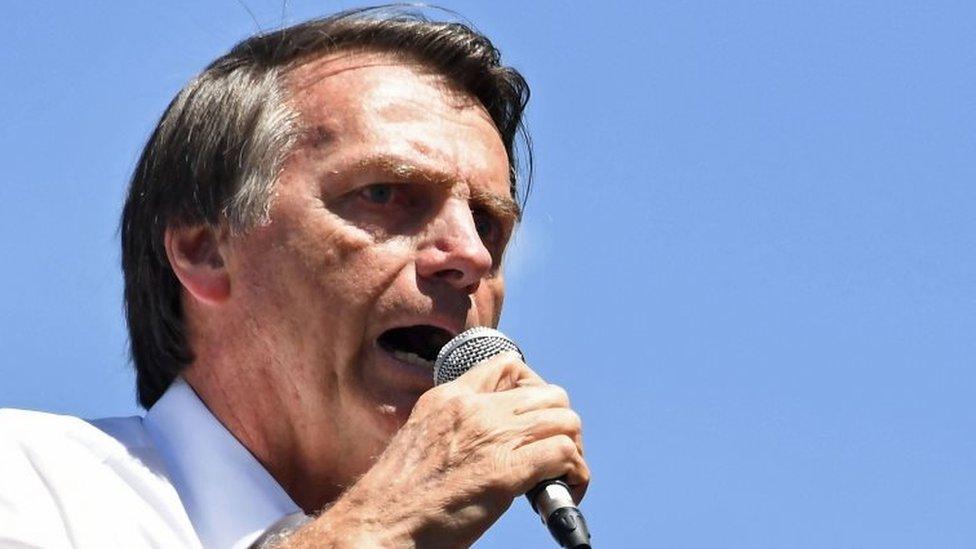 Jair Bolsonaro speaks during a campaign rally in Brasilia.