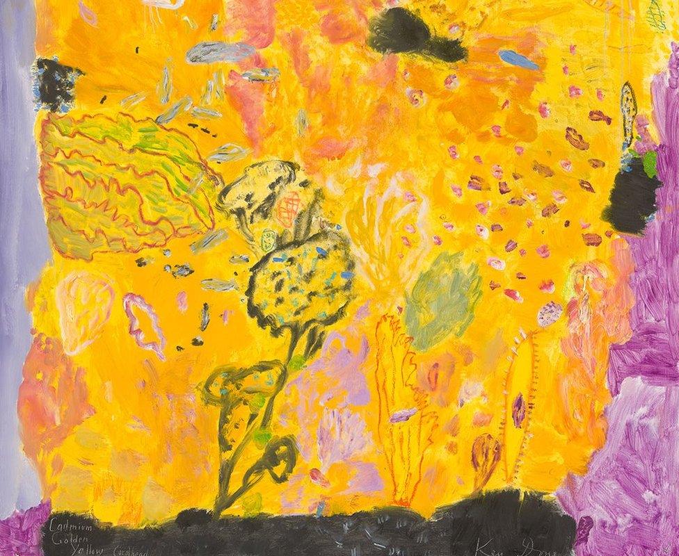 A bright yellow painting of flowers.