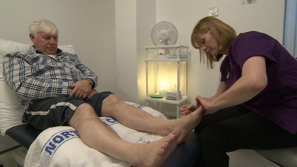 Malcolm Kavanagh receiving acupuncture