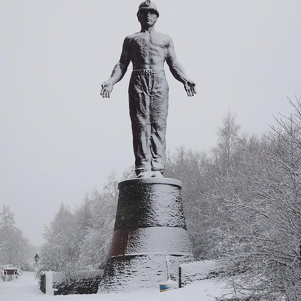 Snow settles on the Guardian of the former Six Bells colliery site, near Abertillery in Blaenau Gwent.