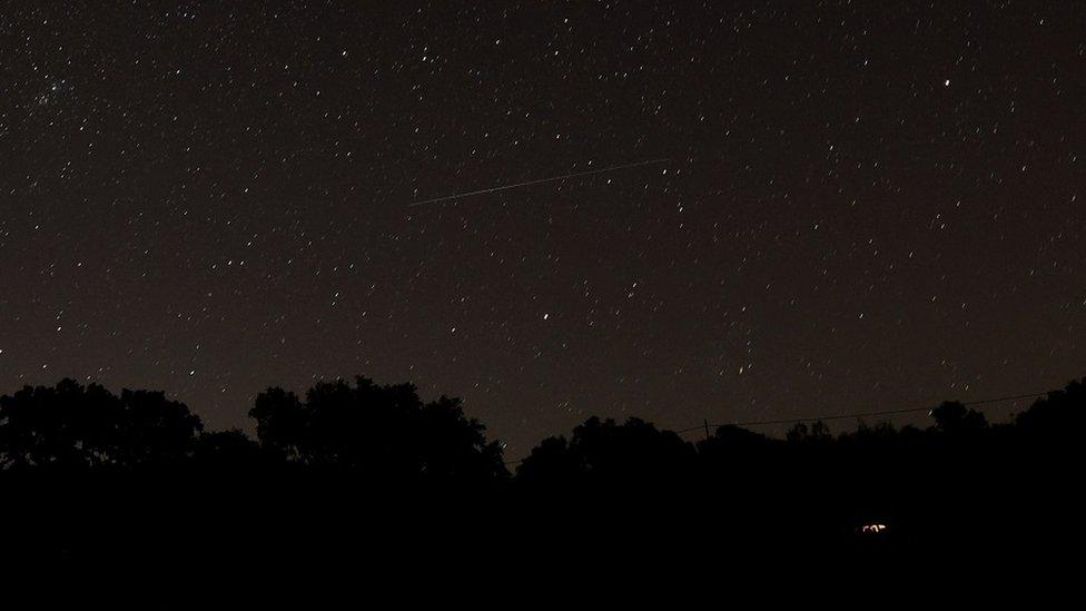 A meteor can be seen during the annual Perseid meteor shower in Ronda, Spain