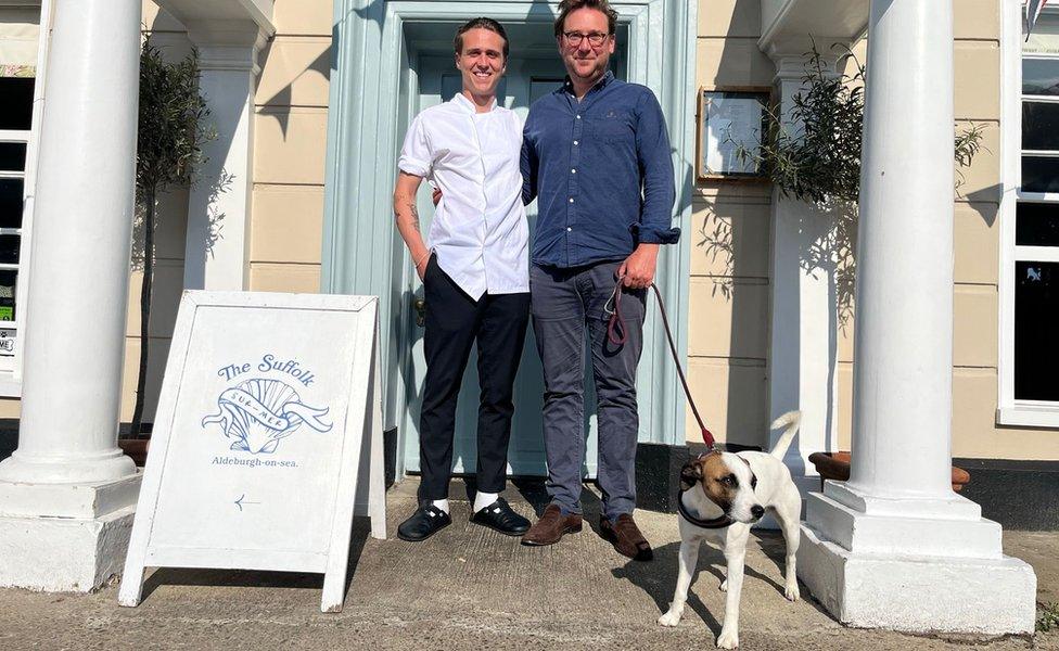 Tom Payne with George Pell and dog Oscar outside The Suffolk in Aldeburgh