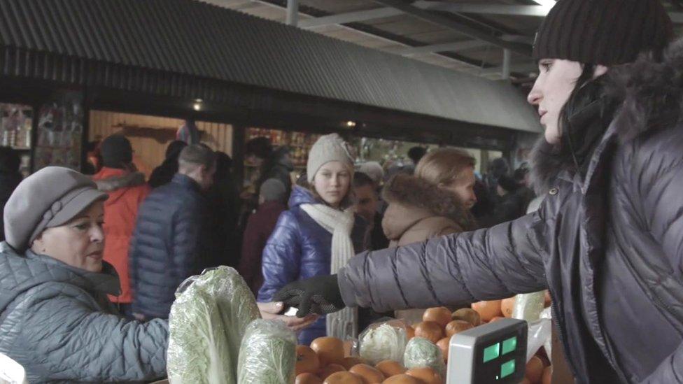 Roubles being exchanged at a market in eastern Ukraine