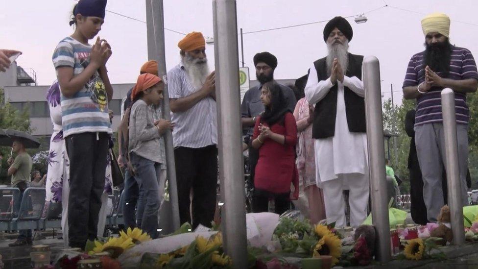 Sikhs from Germany praying