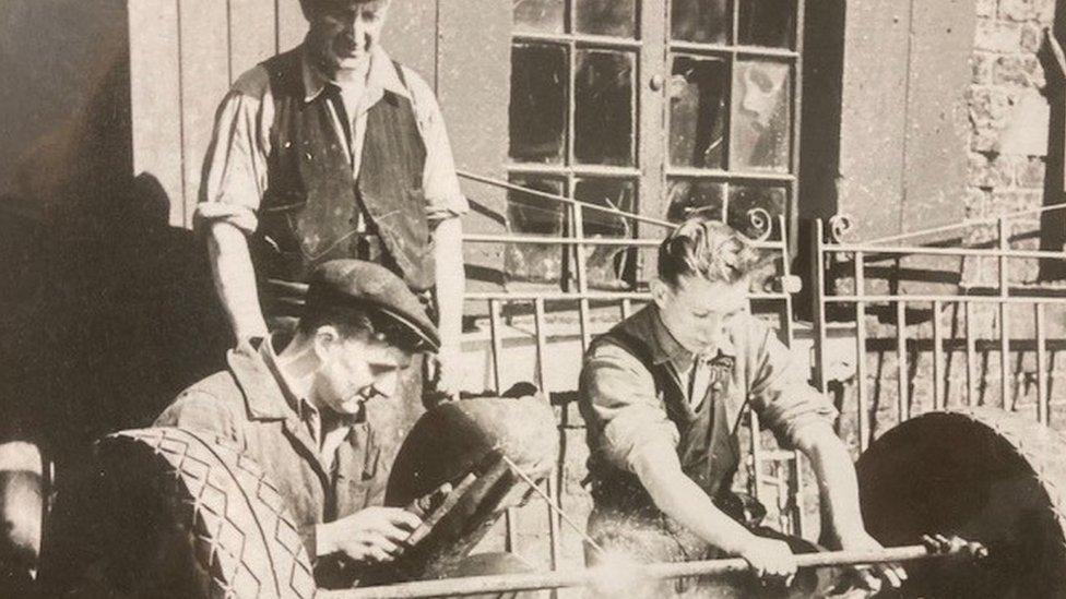 Albert Roberts, on the right at the family smithy. He is the boys’ great-grandad