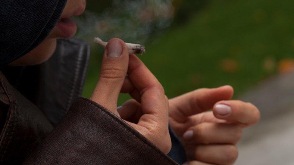 Woman smoking a joint