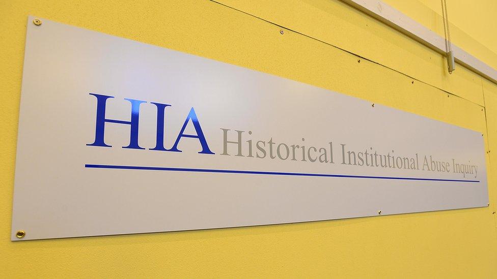 A sign that reads: Historical Institutional Abuse Inquiry