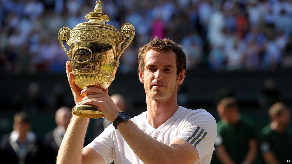 Andy Murray lifting Wimbledon trophy in 2013