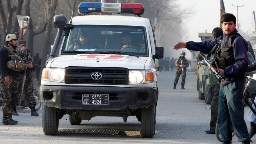 Afghan security forces keep watch at a check point close to the compound of Afghanistan's national intelligence agency in Kabul. Photo: 25 December 2017