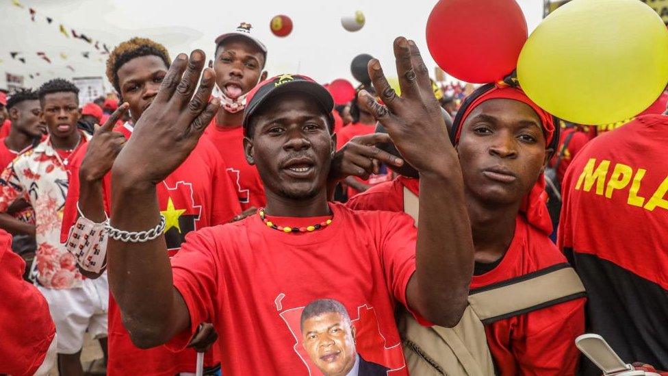 Supporters of incumbent president and People's Movement for the Liberation of Angola - Labour Party (MPLA) presidential candidate Joao Lourenco